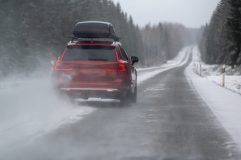 A snowy winter road highlights the importance of reliable car insurance.
