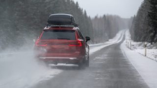 A snowy winter road highlights the importance of reliable car insurance.