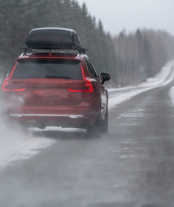 A snowy winter road highlights the importance of reliable car insurance.