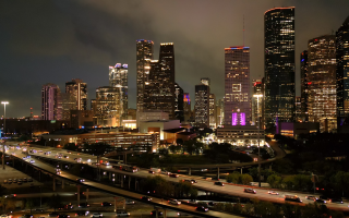 Skyline of Houston Texas by night – Houston, cheap car insurance in Texas