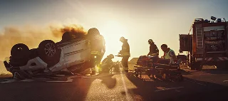Desperation of young driver after traffic accident on the highway; she calls her auto insurance to use her bodily injury liability coverage — cheap bodily injury liability insurance.