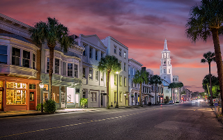 Downtown Charleston South Carolina with sunset, cheap car insurance in South Carolina.