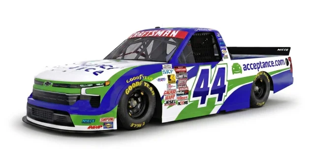 Front side view of Acceptance Insurance number 44 NASCAR truck on white background