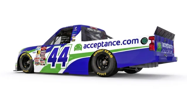 Rear side view of Acceptance Insurance number 44 NASCAR truck showing sponsor branding