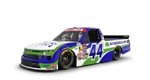 Front side view of Acceptance Insurance number 44 NASCAR truck on white background