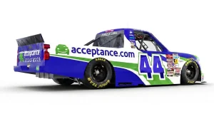 Side view of Acceptance Insurance number 44 NASCAR truck from alternate angle