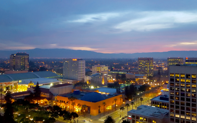 San Jose, Silicon Valley, view of downtown, the Tech Museum, McEnery Convention Center, Silicon Valley, and the Santa Cruz Mountains at sunset.