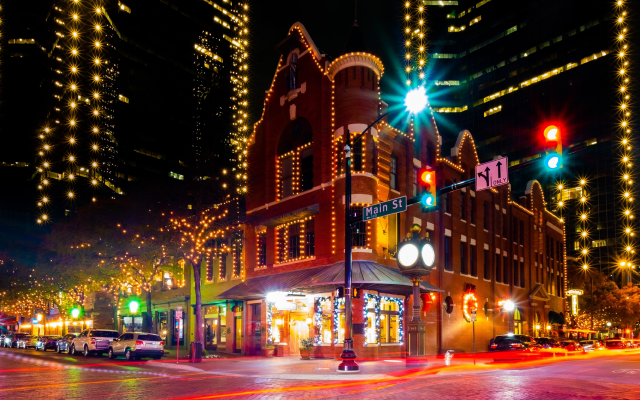 Night Street in Fort Worth, Texas, USA. Cheap car insurance in Texas.